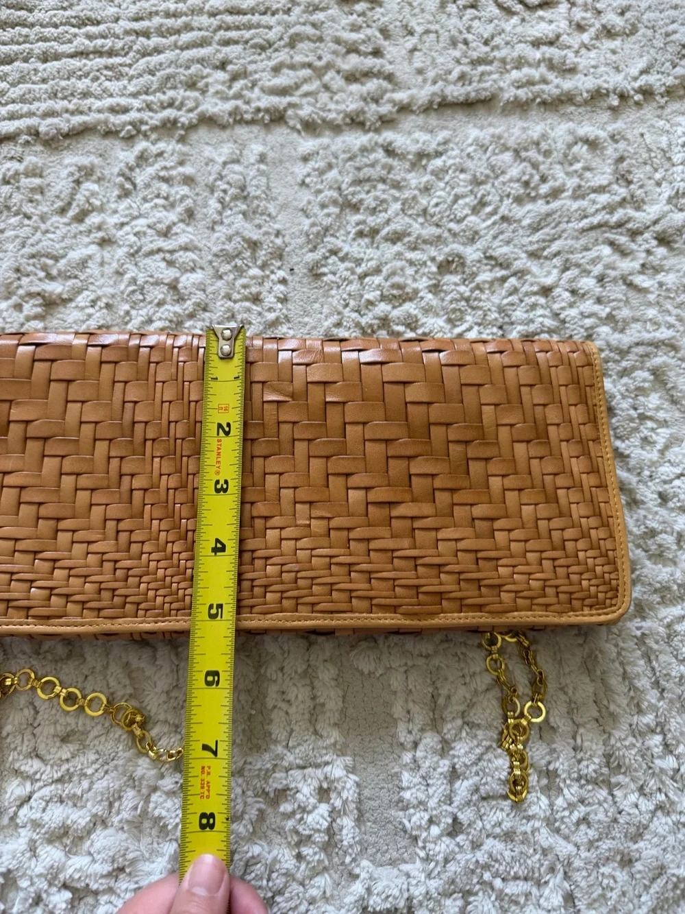 Cole Haan's iconic Genevieve woven leather tan crossbody bag